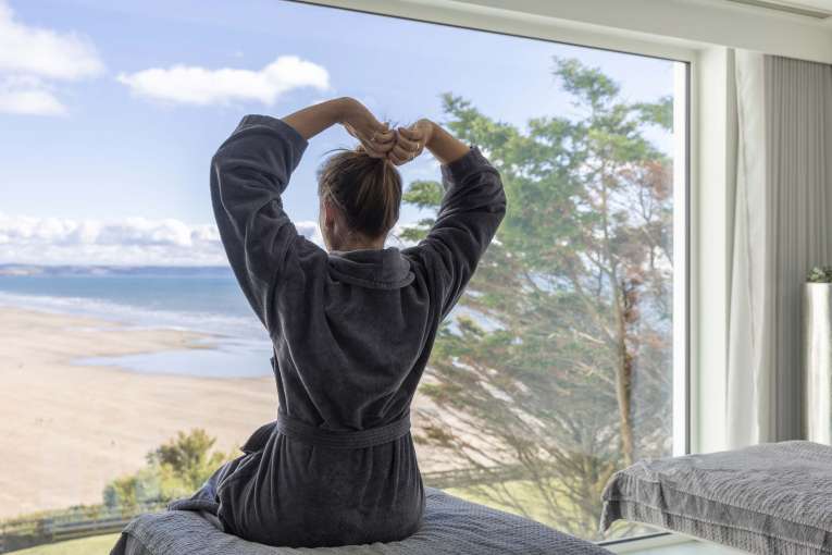 Saunton Sands Hotel Source Spa Guest Stretching and Enjoying View after Massage