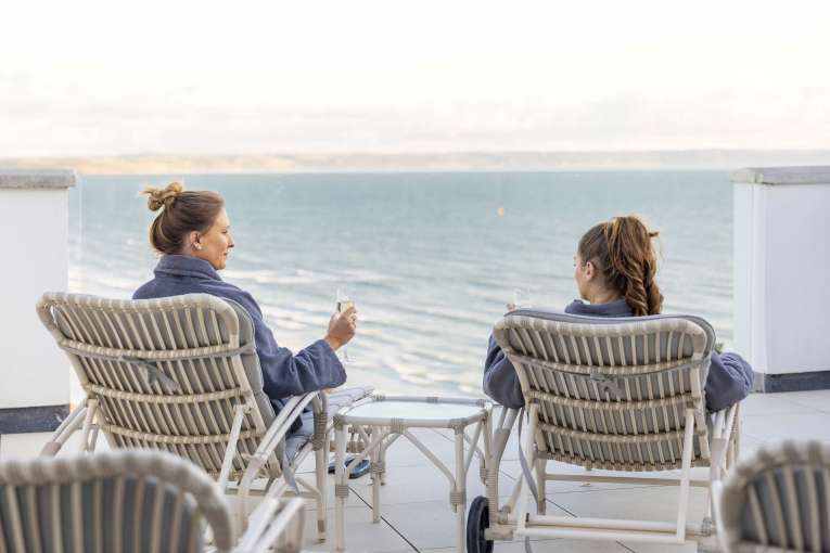 Saunton Sands Hotel Source Spa Guests Enjoying View from Sun Deck on Loungers with Champagne