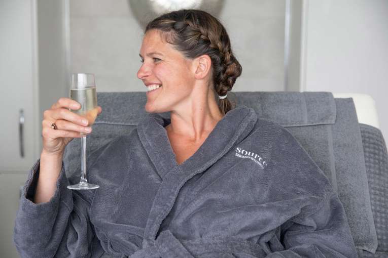 Saunton Sands Hotel Source Spa Guest Enjoying Prosecco in Treatment Room