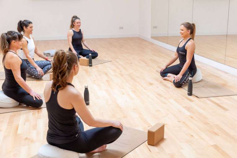 Group yoga class in the Source Studio