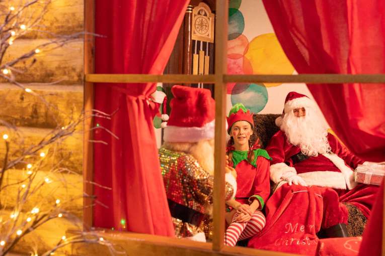 Santas grotto with elf