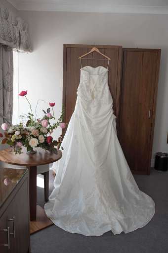Wedding dress in bedroom at Saunton Sands Hotel