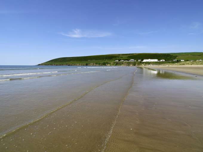 Saunton Sands Hotel shot from the beach with the sea 