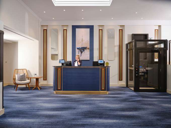 Lady at reception on the phone at Saunton Sands Hotel