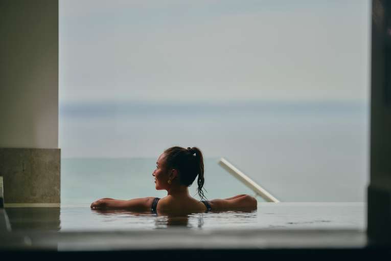 lady in the vitality pool looking to the side