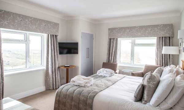 Saunton Sands Hotel Family Suite (308) Accommodation Bedroom with Television and Sea View