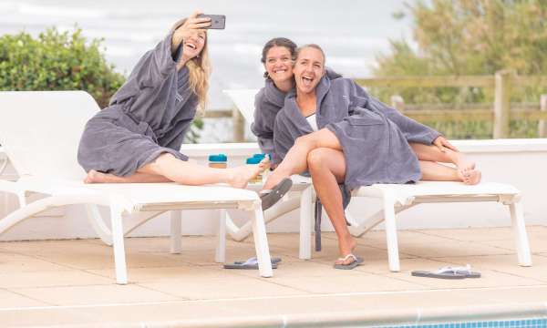 Ladies by outdoor pool