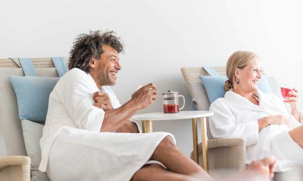 Couple in spa relaxation lounge