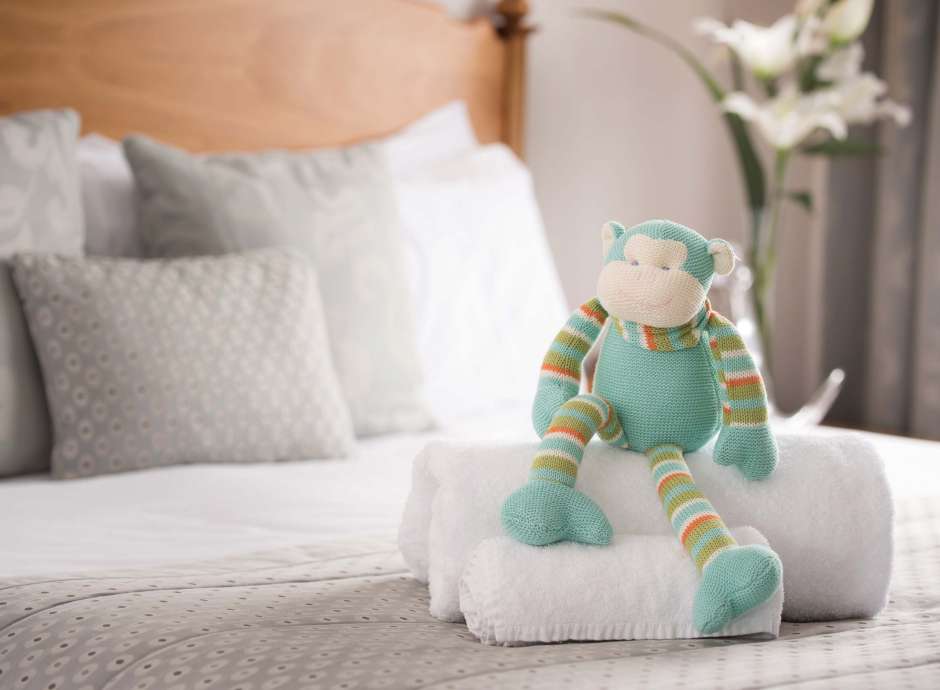 Saunton Sands Hotel Accommodation Bedroom Cuddly Monkey Childs Soft Toy on Bed