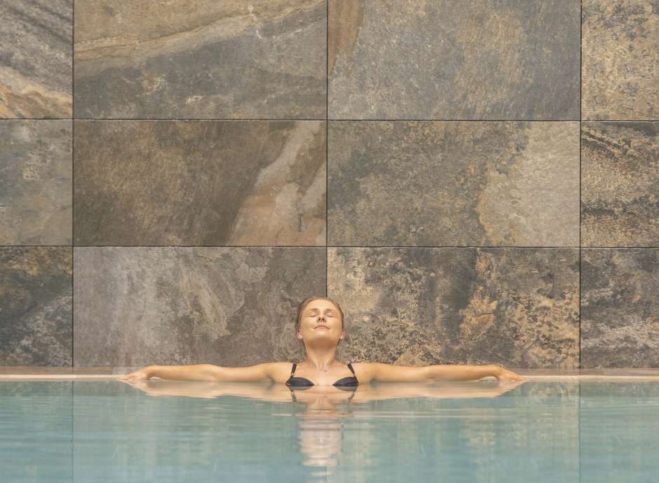 Saunton Sands Hotel Source Spa Guest Relaxing in Indoor Swimming Pool