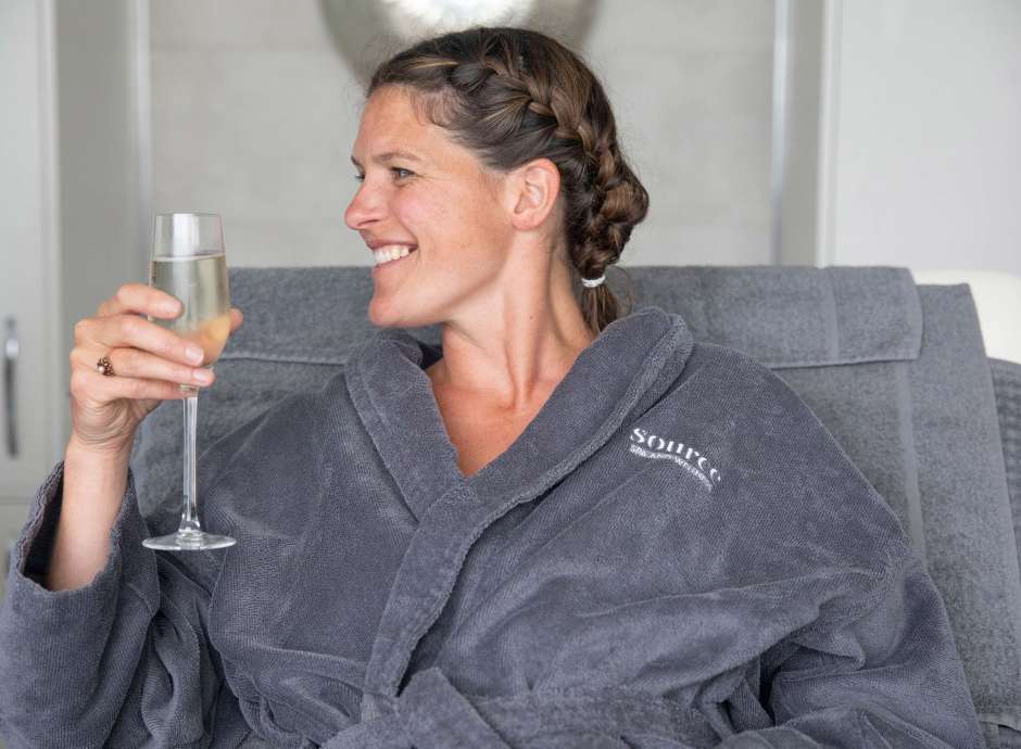 Saunton Sands Hotel Source Spa Guest Enjoying Prosecco in Treatment Room
