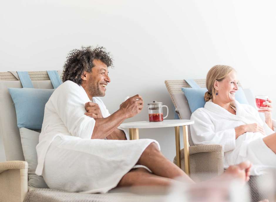 Couple in spa relaxation lounge