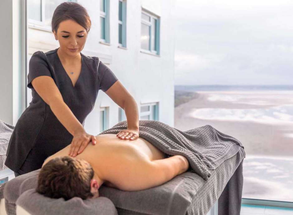 Man having a massage in double treatment room