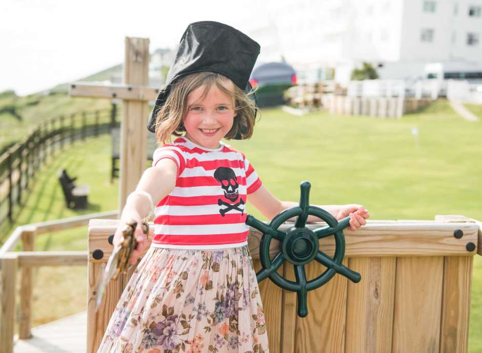 Child playing in pirate ship