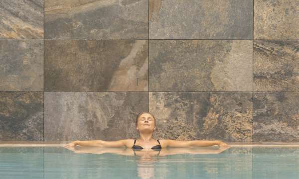 Saunton Sands Hotel Source Spa Guest Relaxing in Indoor Swimming Pool