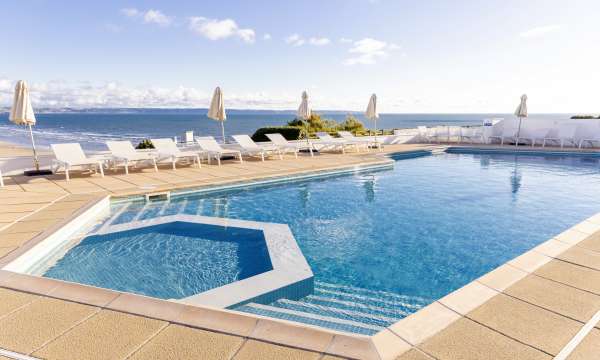 Saunton Sands Hotel Outdoor Pool with Sun Loungers and View over Saunton Beach