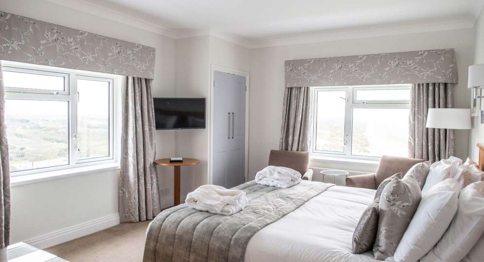 Saunton Sands Hotel Family Suite (308) Accommodation Bedroom with Television and Sea View